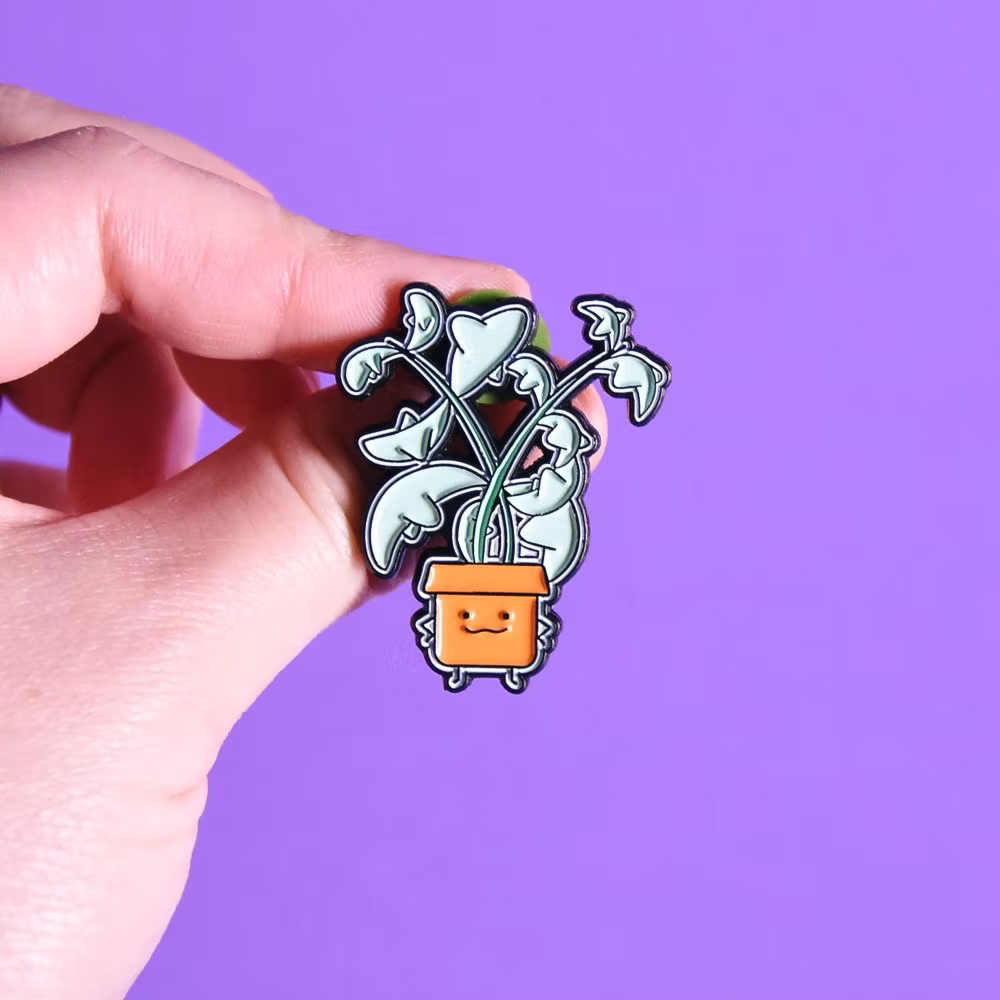 STRING OF DOLPHIN ENAMEL PIN
